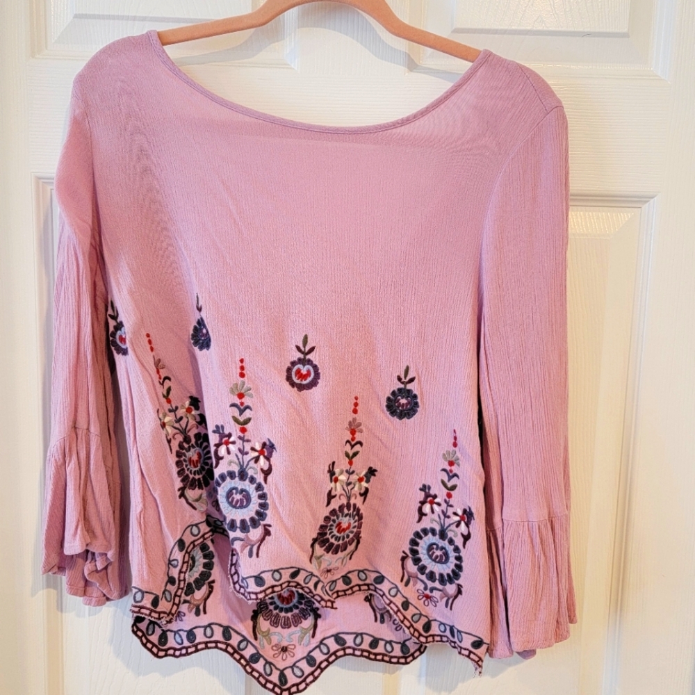 Flowy peasant top with floral embroidery